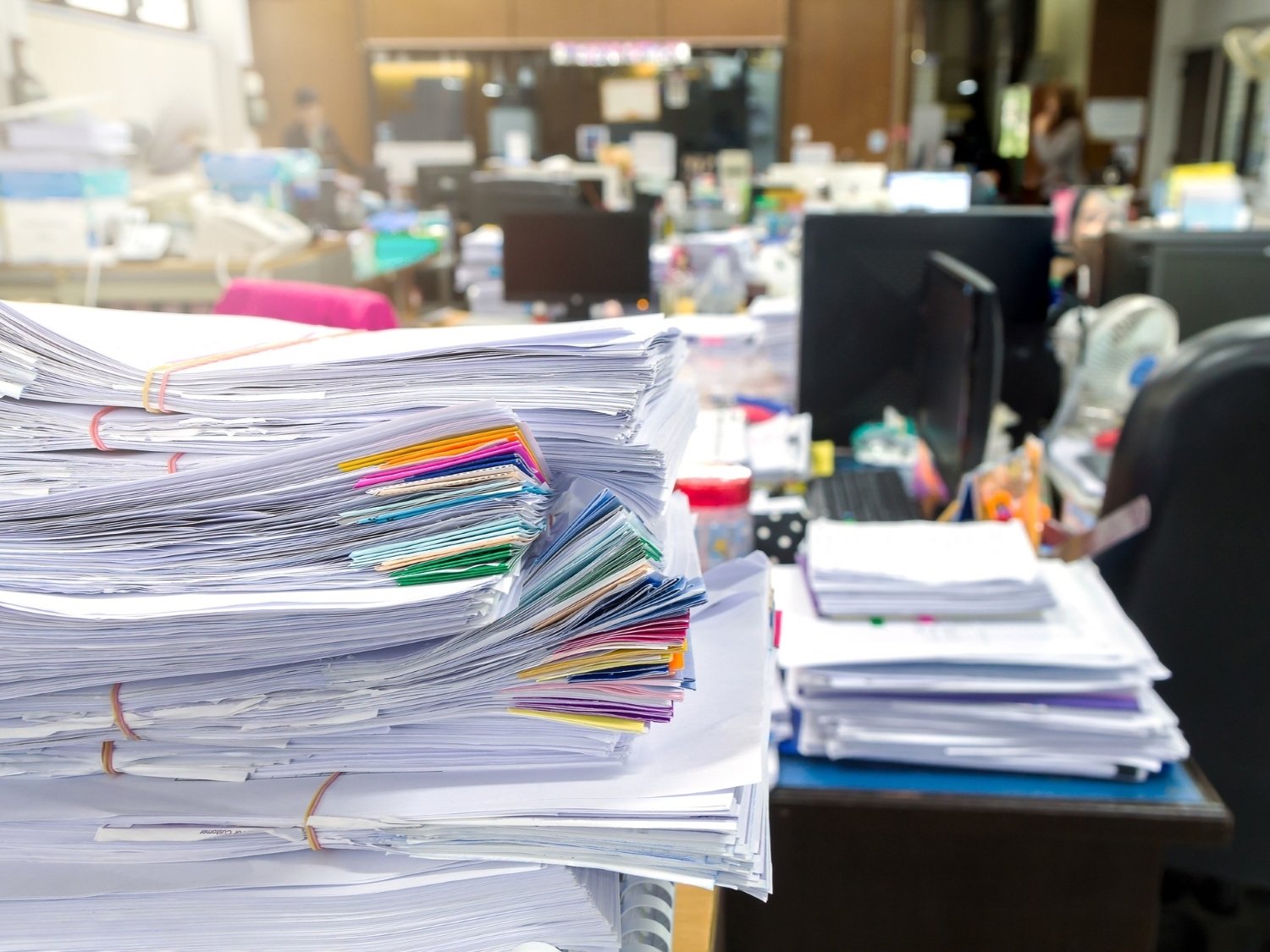 stacks of paper in office